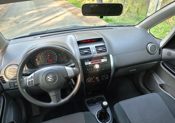 Suzuki SX4 cena 26990 przebieg: 170000, rok produkcji 2009 z Stepnica małe 379